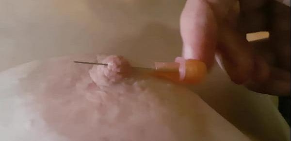  Pushing a needle through my nipple